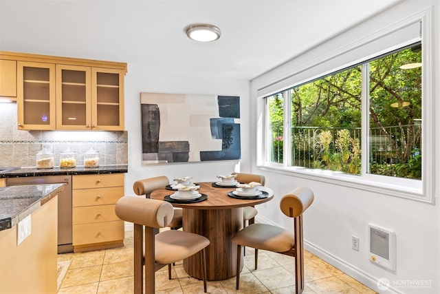 3834 175th Ave NE Unit 101, Redmond, WA 98052 - dining space featuring heating unit and light tile patterned floors