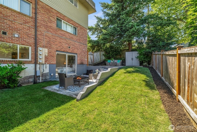3834 175th Ave NE Unit 101, Redmond, WA 98052 - fenced backyard featuring a fire pit, a shed, and a patio area