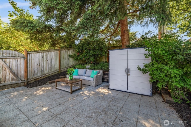 3834 175th Ave NE Unit 101, Redmond, WA 98052 - fenced backyard with a patio and an outdoor hangout area