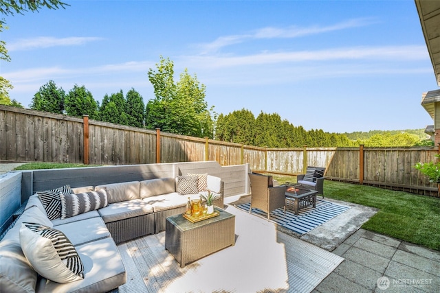 3834 175th Ave NE Unit 101, Redmond, WA 98052 - fenced backyard with an outdoor living space with a fire pit