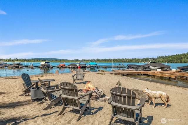 3834 175th Ave NE Unit 101, Redmond, WA 98052 - water view featuring an outdoor fire pit and a boat dock