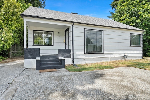 2319 Washington St SE, Olympia, WA 98501 - view of front facade featuring a shingled roof and covered porch