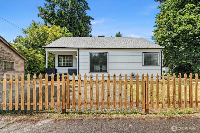 2319 Washington St SE, Olympia, WA 98501 - view of front of home featuring a fenced front yard and a shingled roof