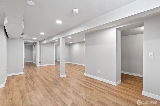 2319 Washington St SE, Olympia, WA 98501 - finished basement featuring recessed lighting, light wood-type flooring, and baseboards