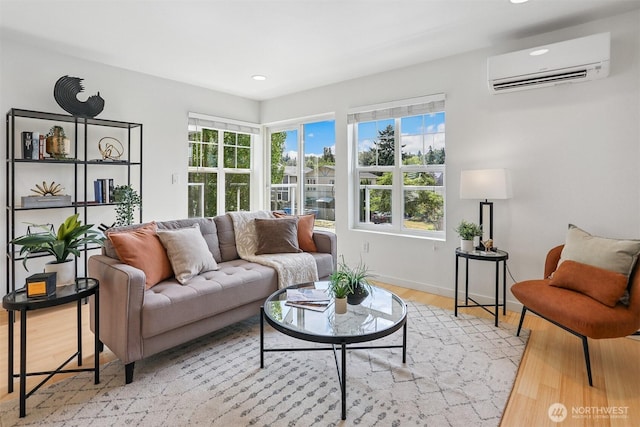 5028 Delridge Way SW Unit C, Seattle, WA 98106 - living area featuring a wall mounted air conditioner, light wood-style flooring, and recessed lighting