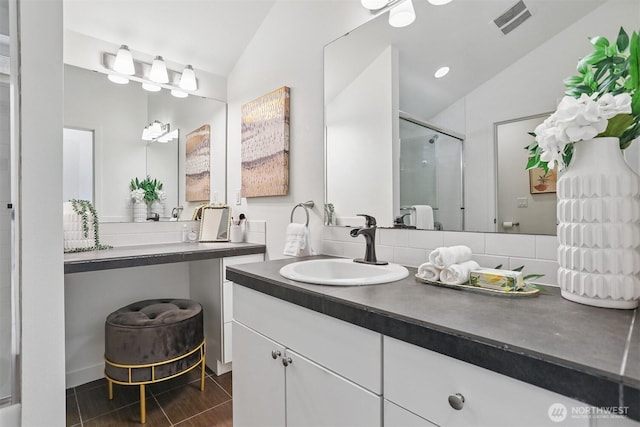 5028 Delridge Way SW Unit C, Seattle, WA 98106 - bathroom with a stall shower, lofted ceiling, vanity, and wood finished floors