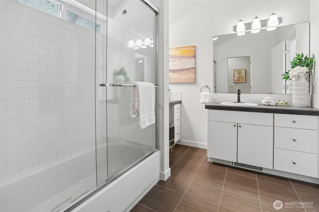 5028 Delridge Way SW Unit C, Seattle, WA 98106 - full bath with vanity, enclosed tub / shower combo, and tile patterned flooring