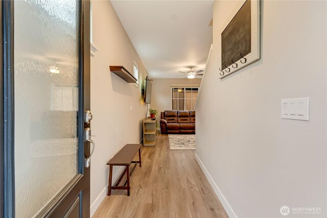 8323 E Gilman Ave, Arlington, WA 98223 - corridor with light wood-style flooring and baseboards