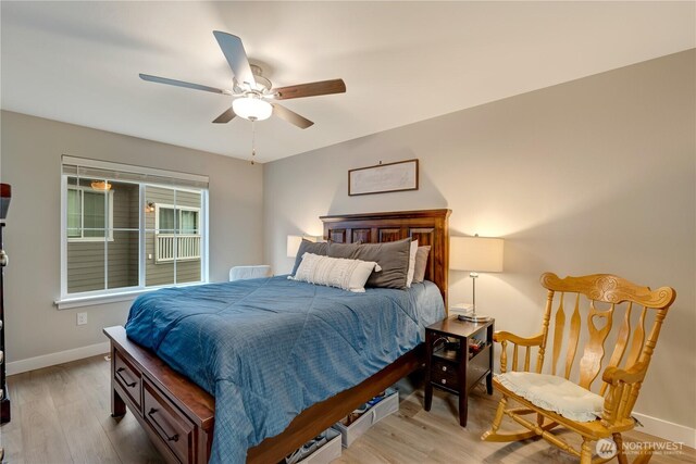 8323 E Gilman Ave, Arlington, WA 98223 - bedroom with baseboards, wood finished floors, and a ceiling fan