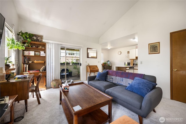 8530 Nesbit Ave N, Seattle, WA 98103 - living room featuring light colored carpet, an office area, and high vaulted ceiling