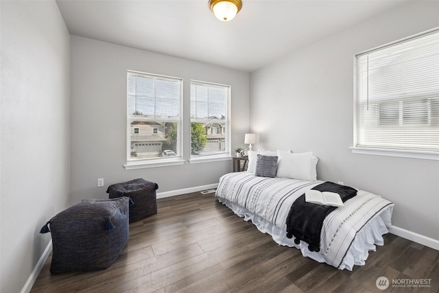 18216 80th Ave E, Puyallup, WA 98375 - bedroom featuring dark wood-type flooring and baseboards