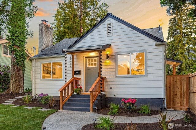 4022 N 19th St, Tacoma, WA 98406 - bungalow with a chimney and roof with shingles
