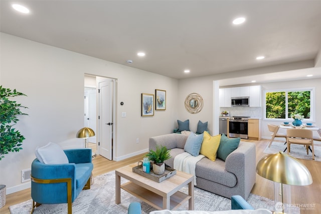 4022 N 19th St, Tacoma, WA 98406 - living area with recessed lighting, light wood-style floors, and baseboards