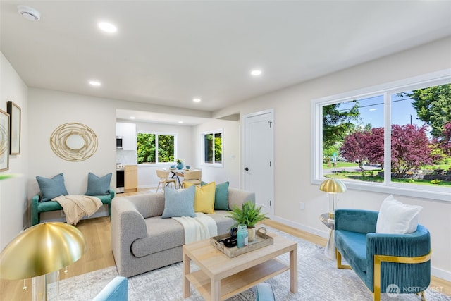 4022 N 19th St, Tacoma, WA 98406 - living room featuring light wood-style flooring, recessed lighting, and baseboards