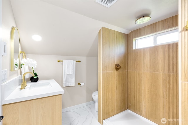 4022 N 19th St, Tacoma, WA 98406 - bathroom featuring vanity, marble finish flooring, tiled shower, toilet, and baseboards