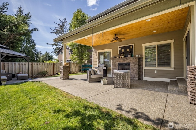 6214 207th Ave E, Bonney Lake, WA 98391 - view of patio featuring a ceiling fan and outdoor lounge area