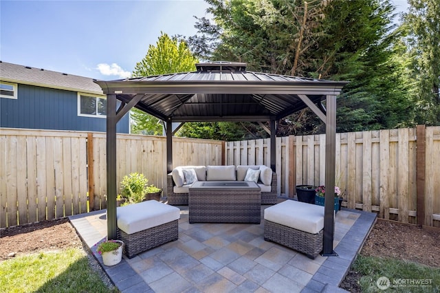 6214 207th Ave E, Bonney Lake, WA 98391 - fenced backyard featuring a gazebo, an outdoor living space, and a patio
