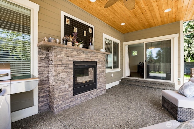 6214 207th Ave E, Bonney Lake, WA 98391 - view of patio with an outdoor stone fireplace