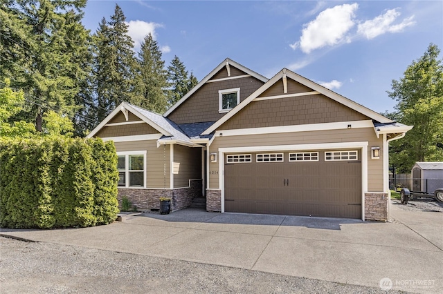 6214 207th Ave E, Bonney Lake, WA 98391 - craftsman inspired home featuring stone siding, driveway, and a garage