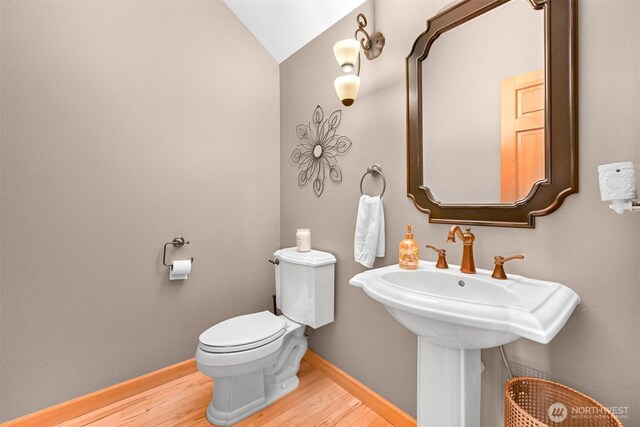 8795 Wood Duck Way, Blaine, WA 98230 - half bath featuring wood finished floors and vaulted ceiling