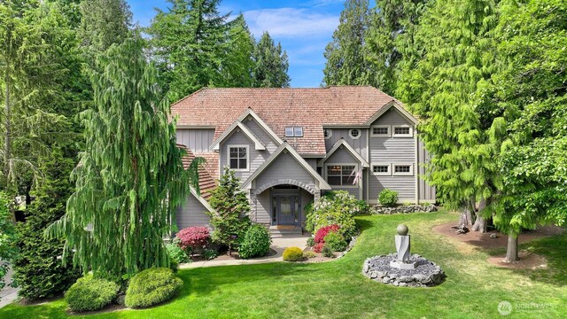 8795 Wood Duck Way, Blaine, WA 98230 - view of front facade featuring a front yard and board and batten siding