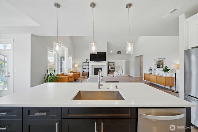 235 Champagne Way, Walla Walla, WA 99362 - kitchen featuring a sink, appliances with stainless steel finishes, open floor plan, and light countertops