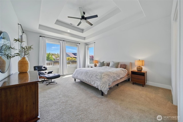 235 Champagne Way, Walla Walla, WA 99362 - bedroom with a tray ceiling, light carpet, a ceiling fan, and baseboards
