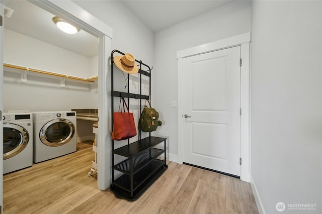 235 Champagne Way, Walla Walla, WA 99362 - laundry area featuring separate washer and dryer, wood finished floors, and baseboards