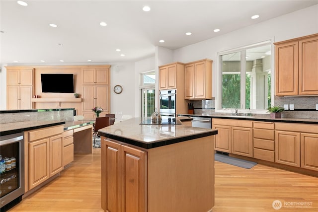 412 N 69th Ave, Yakima, WA 98908 - kitchen featuring wine cooler, light brown cabinetry, light wood finished floors, decorative backsplash, and recessed lighting