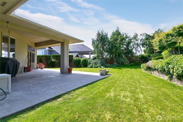 412 N 69th Ave, Yakima, WA 98908 - view of green lawn with a patio