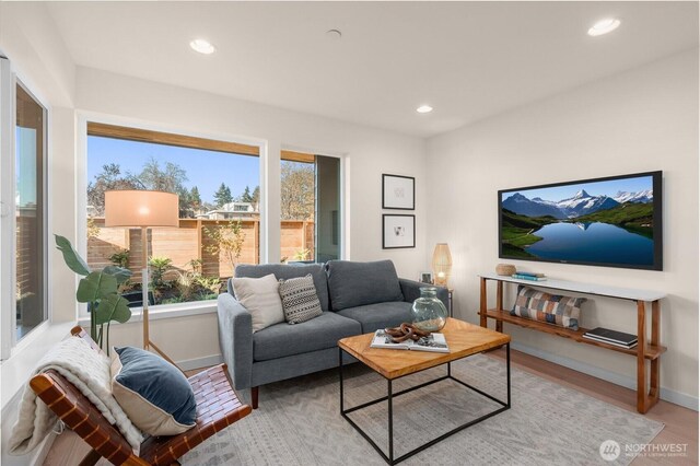 9217B Densmore Ave N, Seattle, WA 98103 - living area featuring baseboards, recessed lighting, and light wood-style floors