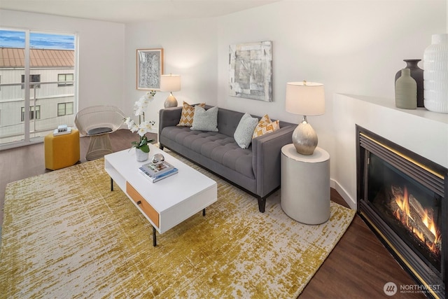 3318 30th Ave SW Unit A502, Seattle, WA 98126 - living room with a glass covered fireplace and wood finished floors