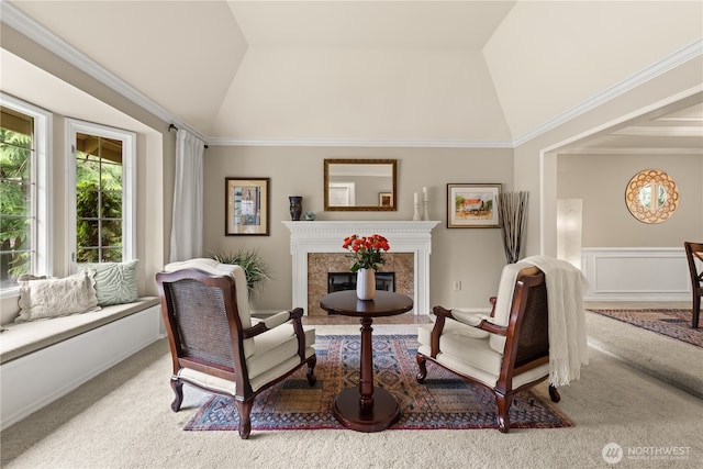 22233 NE 23rd St, Sammamish, WA 98074 - sitting room featuring vaulted ceiling, carpet floors, a fireplace, wainscoting, and crown molding