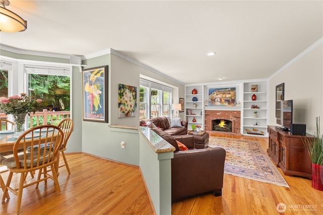 22233 NE 23rd St, Sammamish, WA 98074 - living area with a brick fireplace, light wood-style floors, ornamental molding, and built in shelves