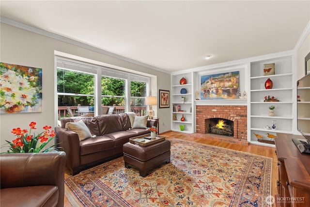 22233 NE 23rd St, Sammamish, WA 98074 - living room with wood finished floors, ornamental molding, a fireplace, and built in shelves