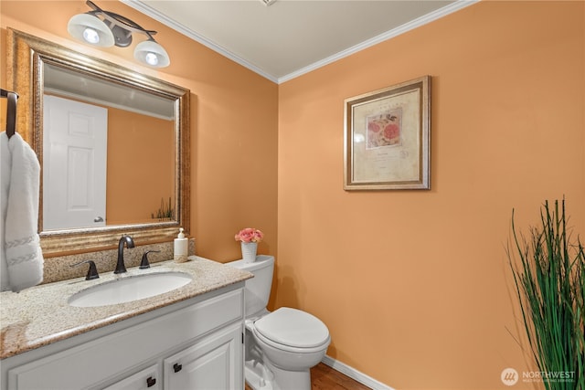 22233 NE 23rd St, Sammamish, WA 98074 - bathroom featuring vanity, crown molding, toilet, and baseboards