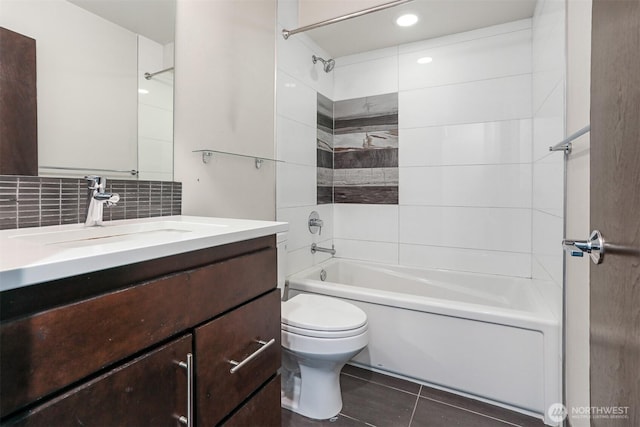 6704 15th Ave NW, Seattle, WA 98107 - full bath with toilet, vanity, shower / washtub combination, tile patterned floors, and tasteful backsplash