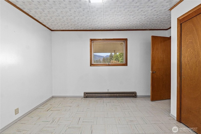705 Old Kettle Rd, Kettle Falls, WA 99141 - unfurnished room with crown molding, baseboard heating, and baseboards