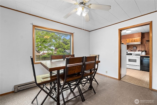 705 Old Kettle Rd, Kettle Falls, WA 99141 - dining area with tile patterned floors, ornamental molding, baseboards, and a ceiling fan