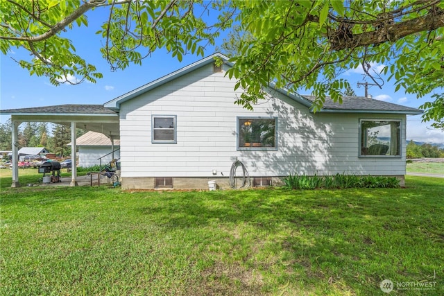 705 Old Kettle Rd, Kettle Falls, WA 99141 - view of home's exterior featuring a lawn