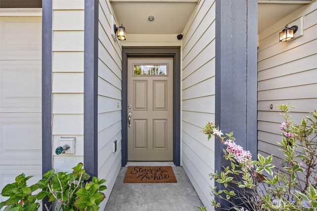 7165 27th Ave SW, Seattle, WA 98106 - property entrance featuring a security system
