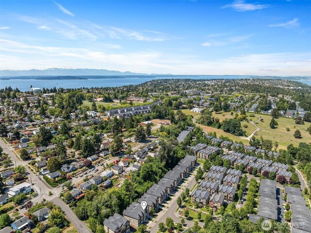 7165 27th Ave SW, Seattle, WA 98106 - aerial view of property's location with a water and mountain view and nearby suburban area