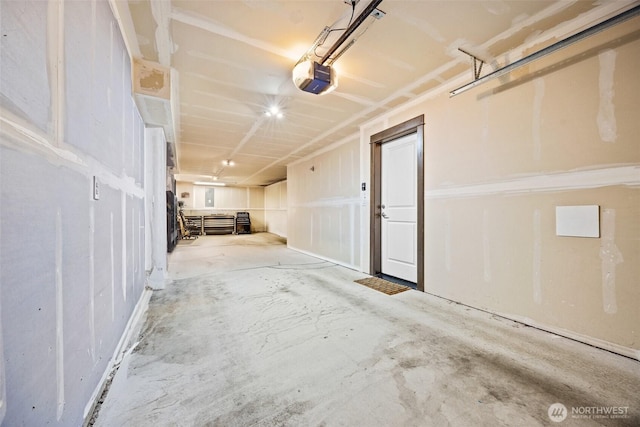 7165 27th Ave SW, Seattle, WA 98106 - garage with a garage door opener