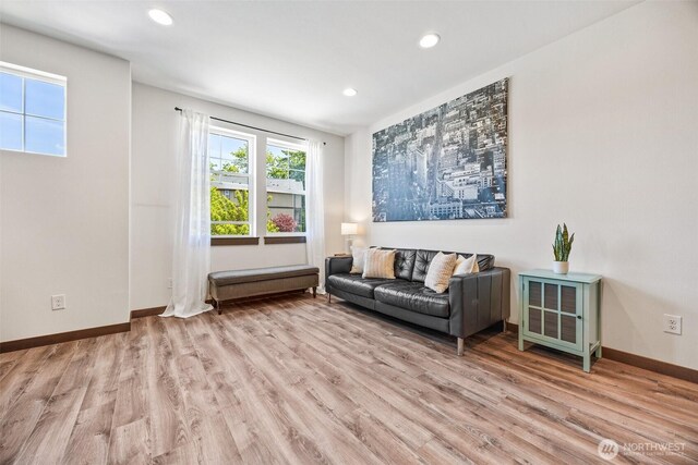 7165 27th Ave SW, Seattle, WA 98106 - living area featuring light wood-style floors, recessed lighting, and baseboards