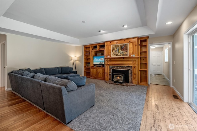 10303 Ski Hill Dr, Leavenworth, WA 98826 - living area featuring light wood finished floors, a raised ceiling, and recessed lighting