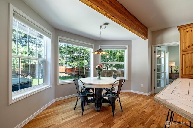 10303 Ski Hill Dr, Leavenworth, WA 98826 - dining space with light wood-style floors and plenty of natural light