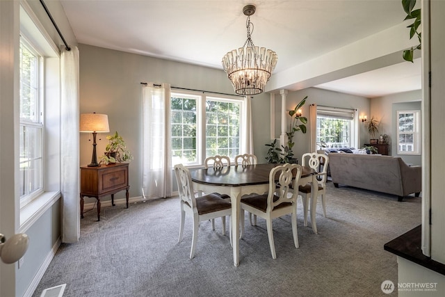 10303 Ski Hill Dr, Leavenworth, WA 98826 - carpeted dining area featuring a chandelier and baseboards