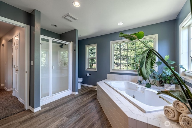 10303 Ski Hill Dr, Leavenworth, WA 98826 - full bathroom featuring a shower stall, a tub with jets, plenty of natural light, wood finished floors, and recessed lighting