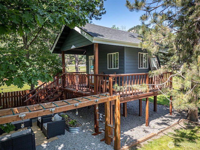 10303 Ski Hill Dr, Leavenworth, WA 98826 - view of side of home with roof with shingles and a deck