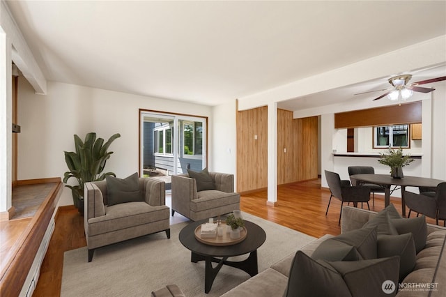 7581 Old Redmond Rd # 4, Redmond, WA 98052 - living area featuring light wood-type flooring and ceiling fan